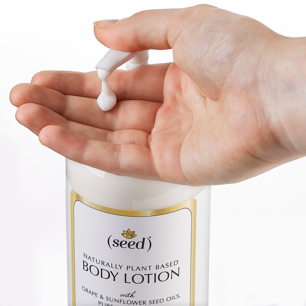 Seed Body Lotion in use - dispensing