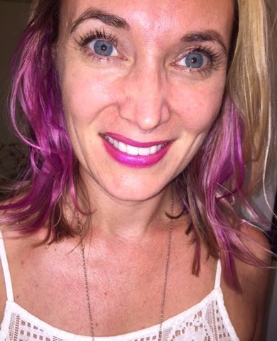 Mandy is wearing Attention Please magenta fuchsia lip gloss from Seed